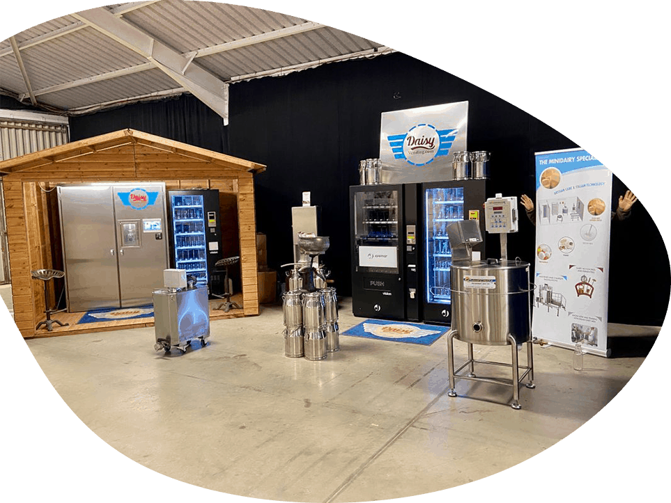 A display of various milkshake machines in a warehouse.