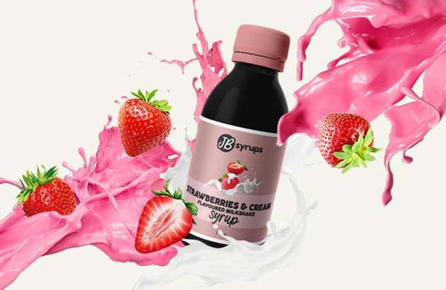 A bottle of strawberry milkshake with a splash of pink liquid.