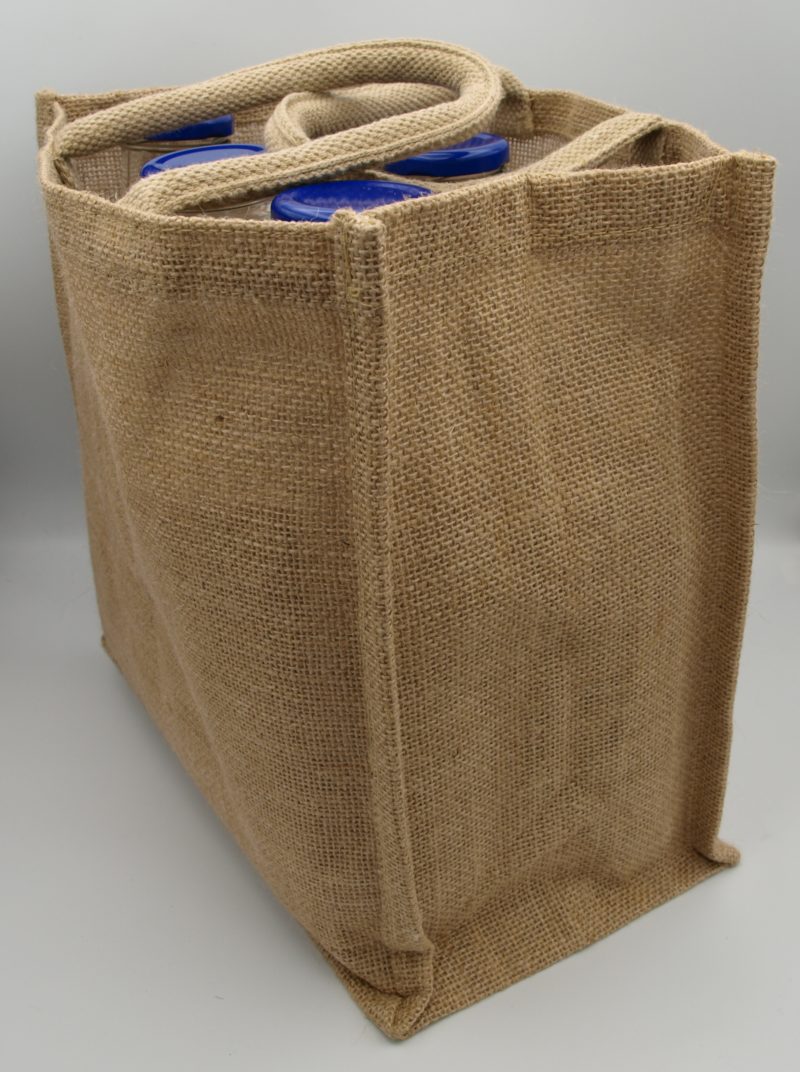 A jute shopping bag with a Handy 6 Bottle Carrier With Divider – Jute in it.